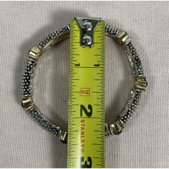 SILVER WITH GOLD ACCENTS & BLUE TOPAZ COLORED STONES. 7 STONES ON BRACELET - Picture 3 of 3